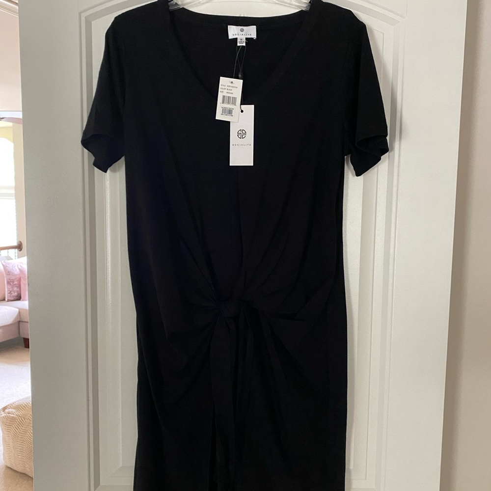 Socialite black dress with the neck and tie waist. Size medium.